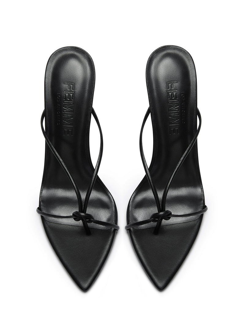 FEMME LA black Akira Slipper mules, overhead flat lay showing FEMME embossed insoles and knotted toe straps at pointed toes