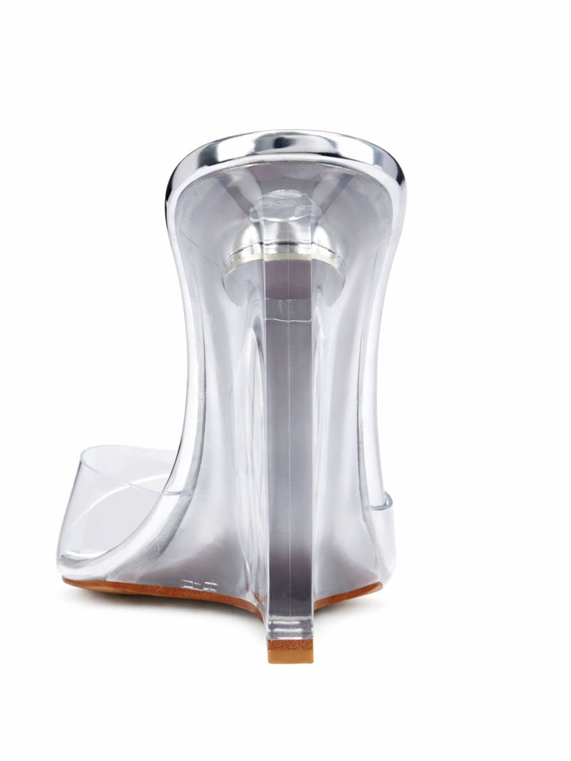 FEMME LA Azucar Wedge in liquid metal, back view showing clear PVC wedge structure and silver metal counter