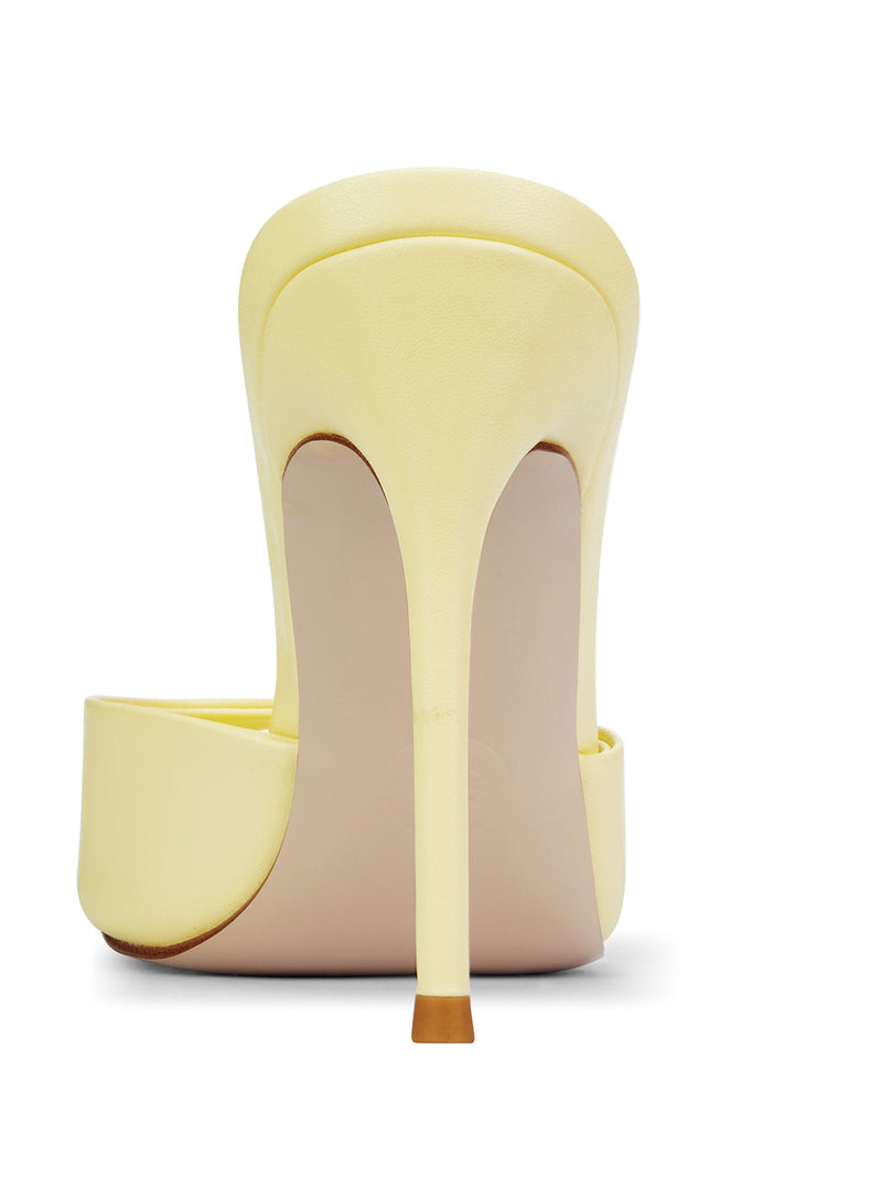 Bella Slipper in Baby Yellow – rear view showing slim stiletto heel and sculpted pale yellow satin back vamp