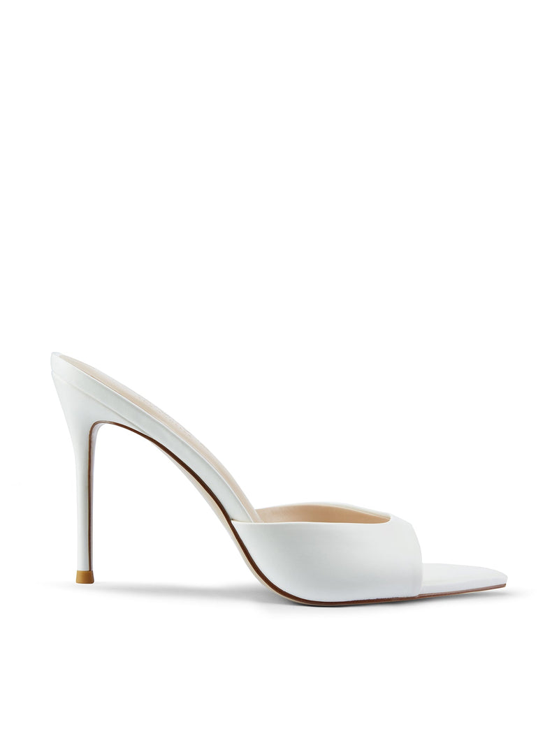 Bella Slipper in White – side profile of white satin padded vamp mule with open pointed toe and slim stiletto heel