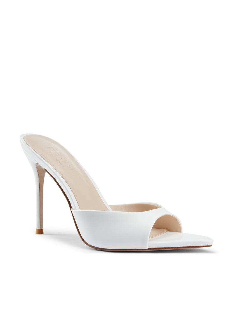 Bella Slipper in White – front three-quarter view of white satin padded vamp showing cream insole and pointed toe
