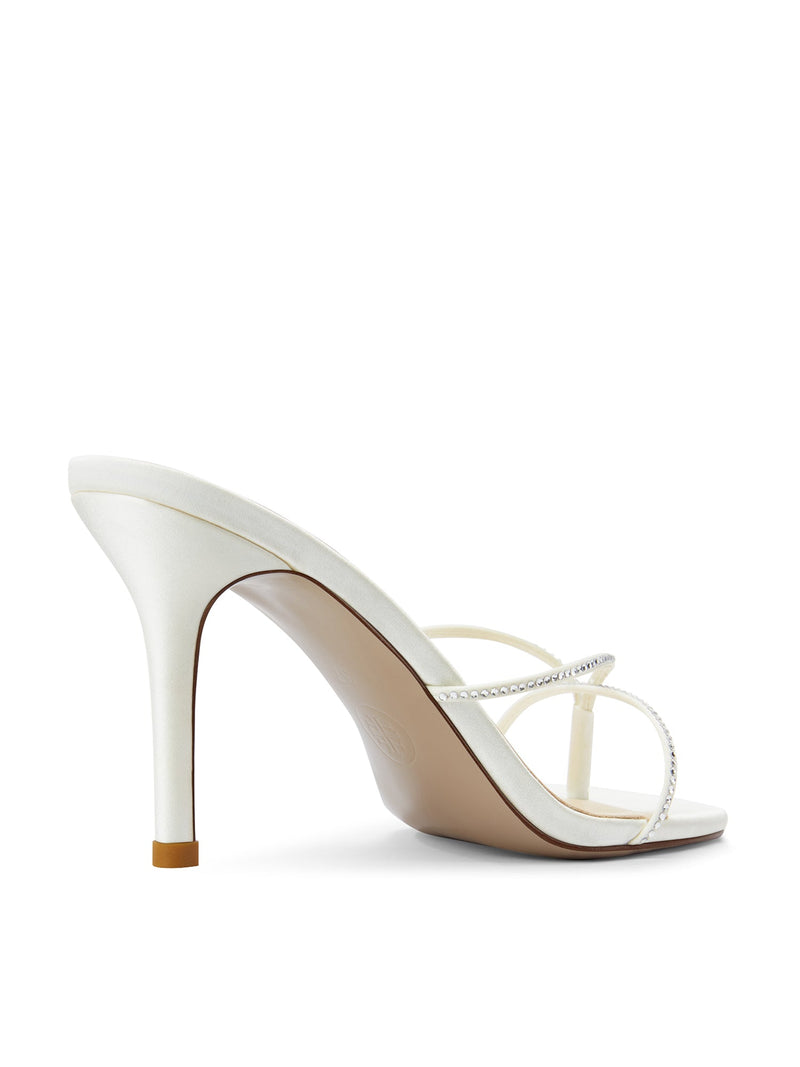 Femme LA Sicilian Slipper in White Crystal – rear three-quarter view showing white satin heel and clear crystal straps from behind